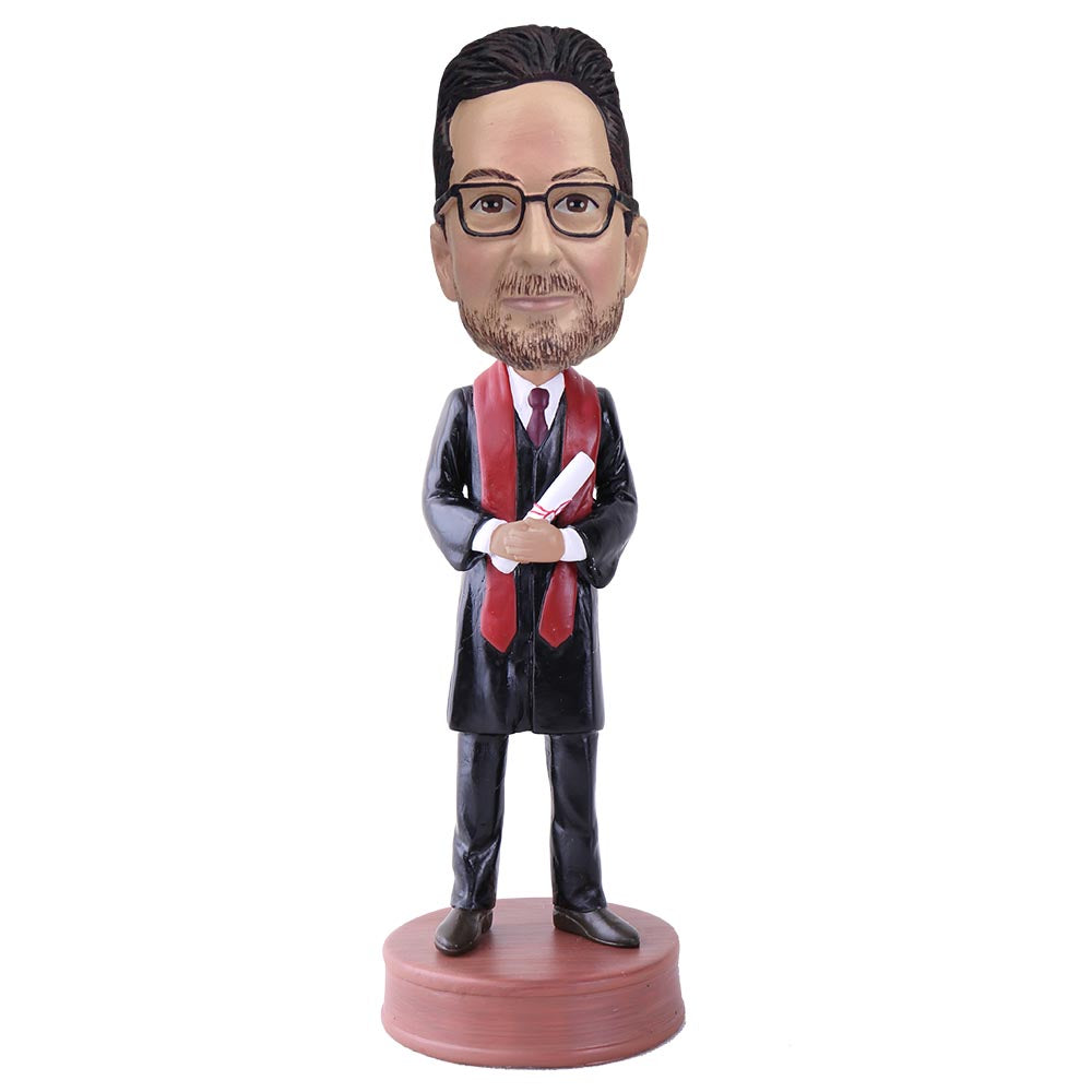 Male Graduate holding Diploma